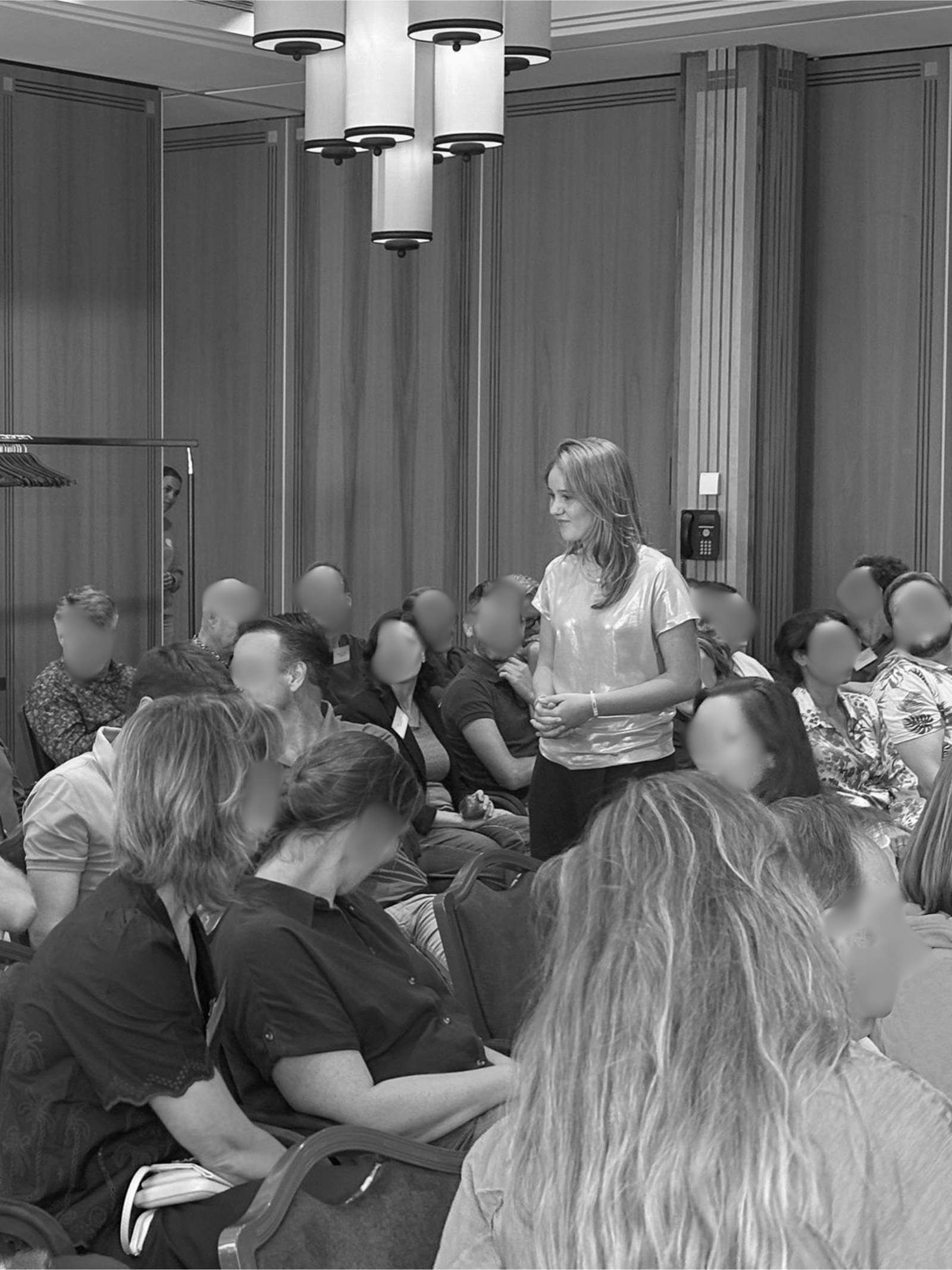 Laurine Beele speaking on stage