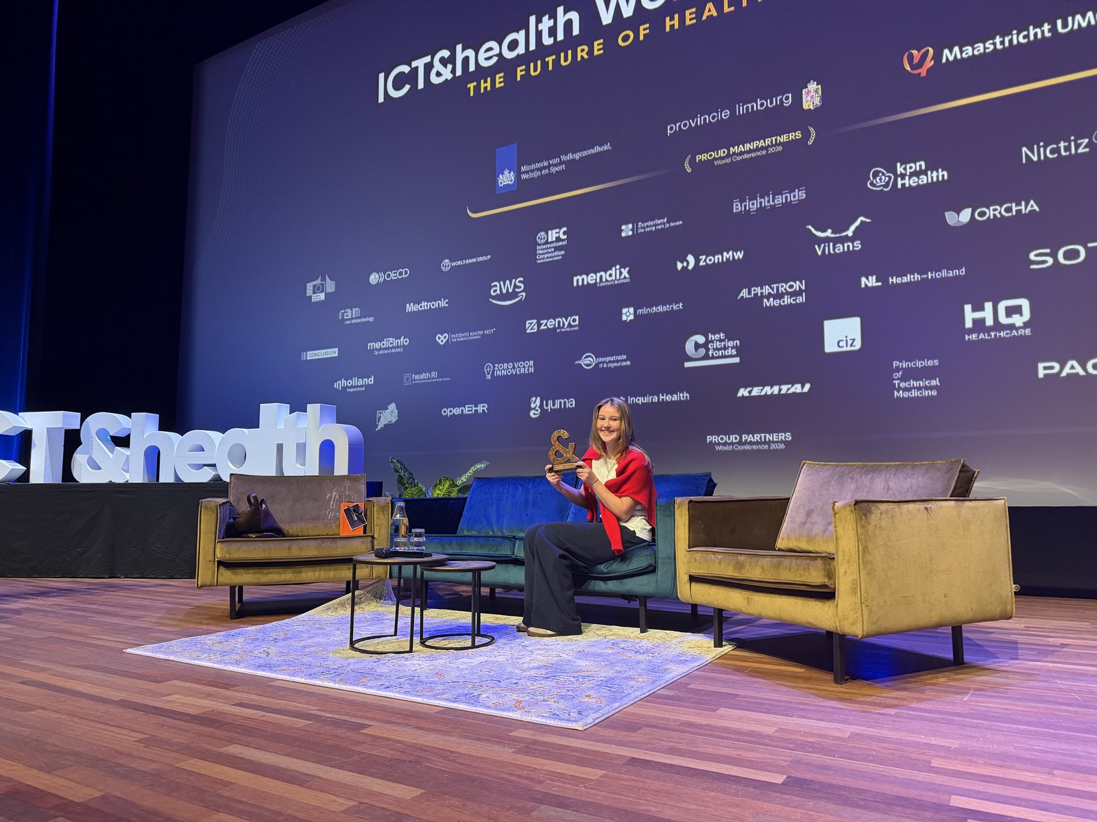 Laurine on stage at the ICT&health World Conference